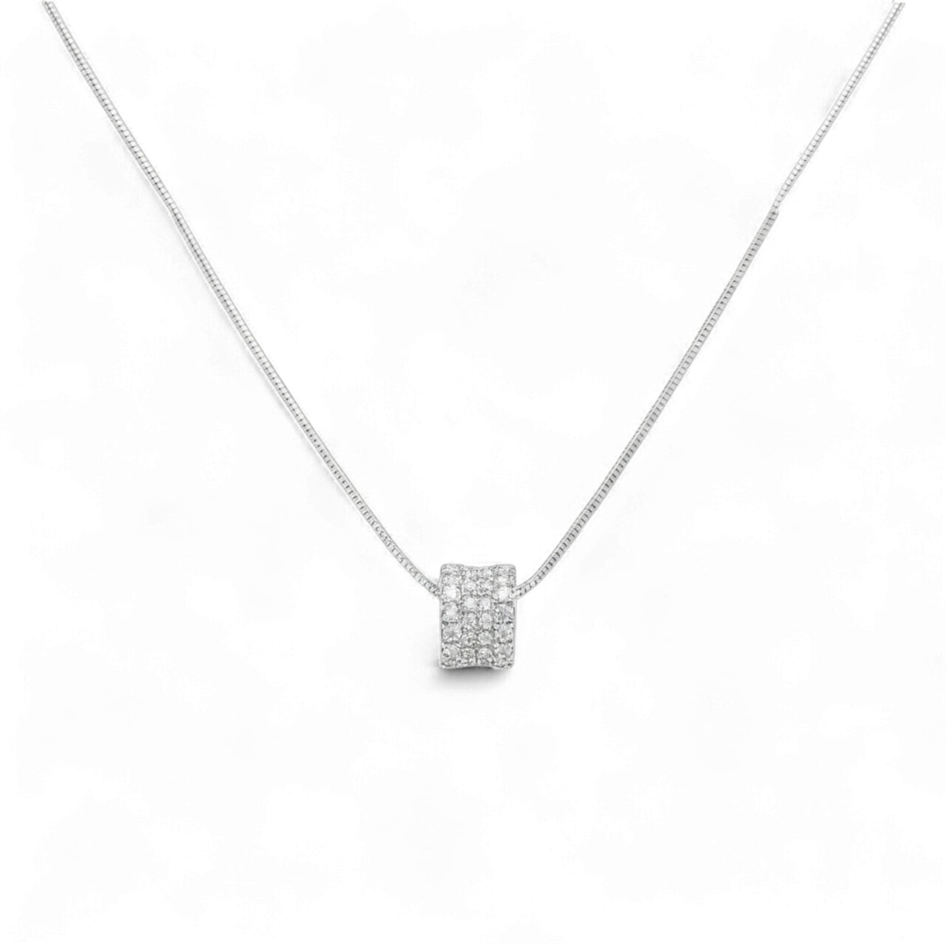 Silver necklace with a square pendant on a white background