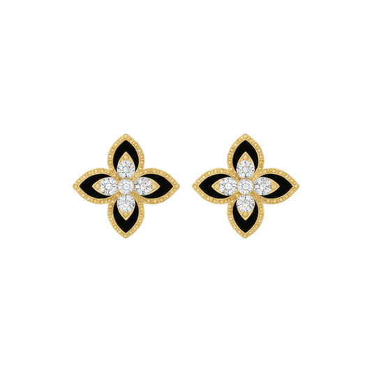 Pair of gold, black, and diamond flower-shaped earrings on a white background