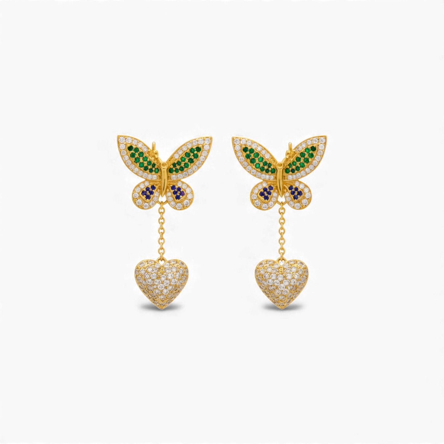Butterfly earrings with heart pendants on a white background
