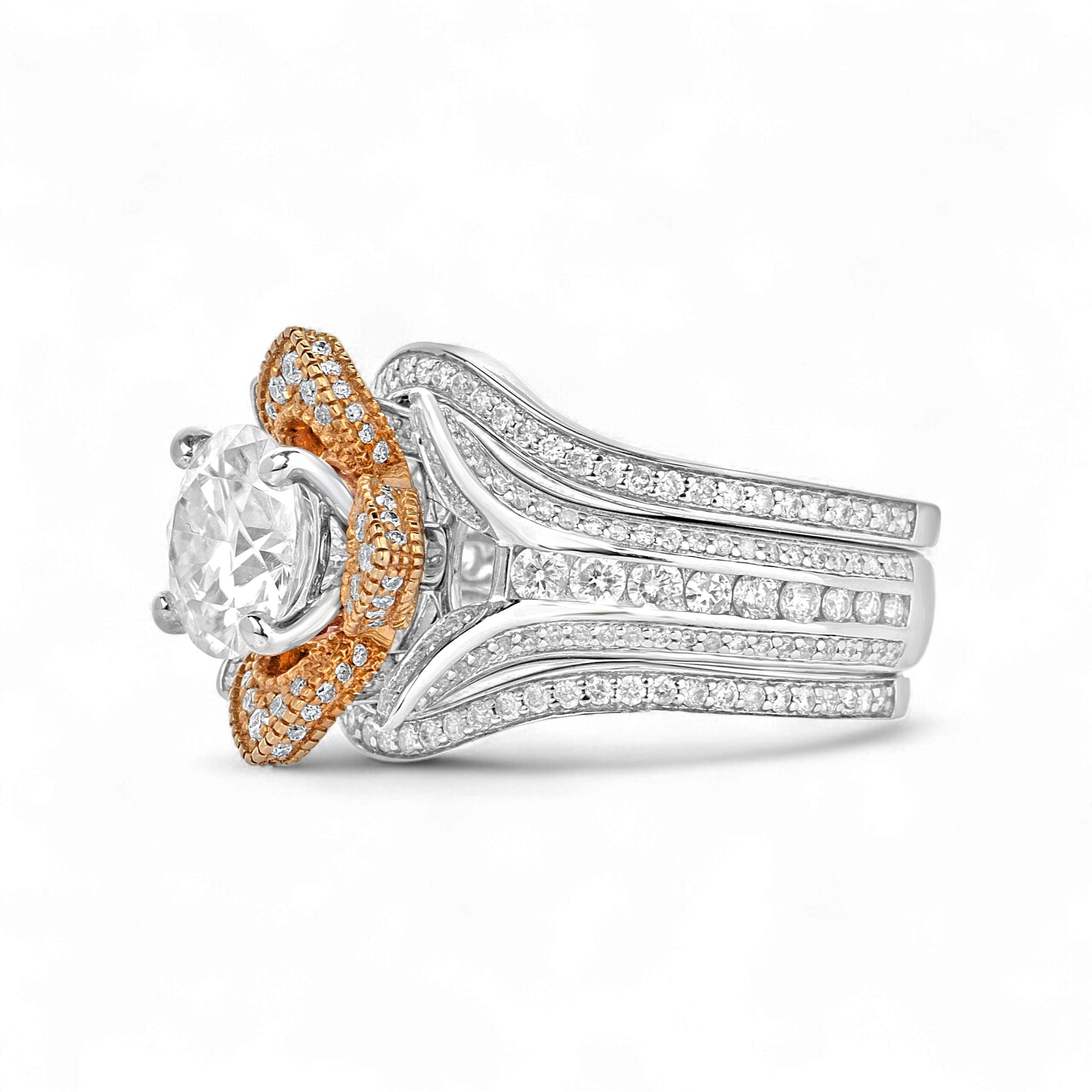 Two-tone diamond ring with gold and silver bands on a white background