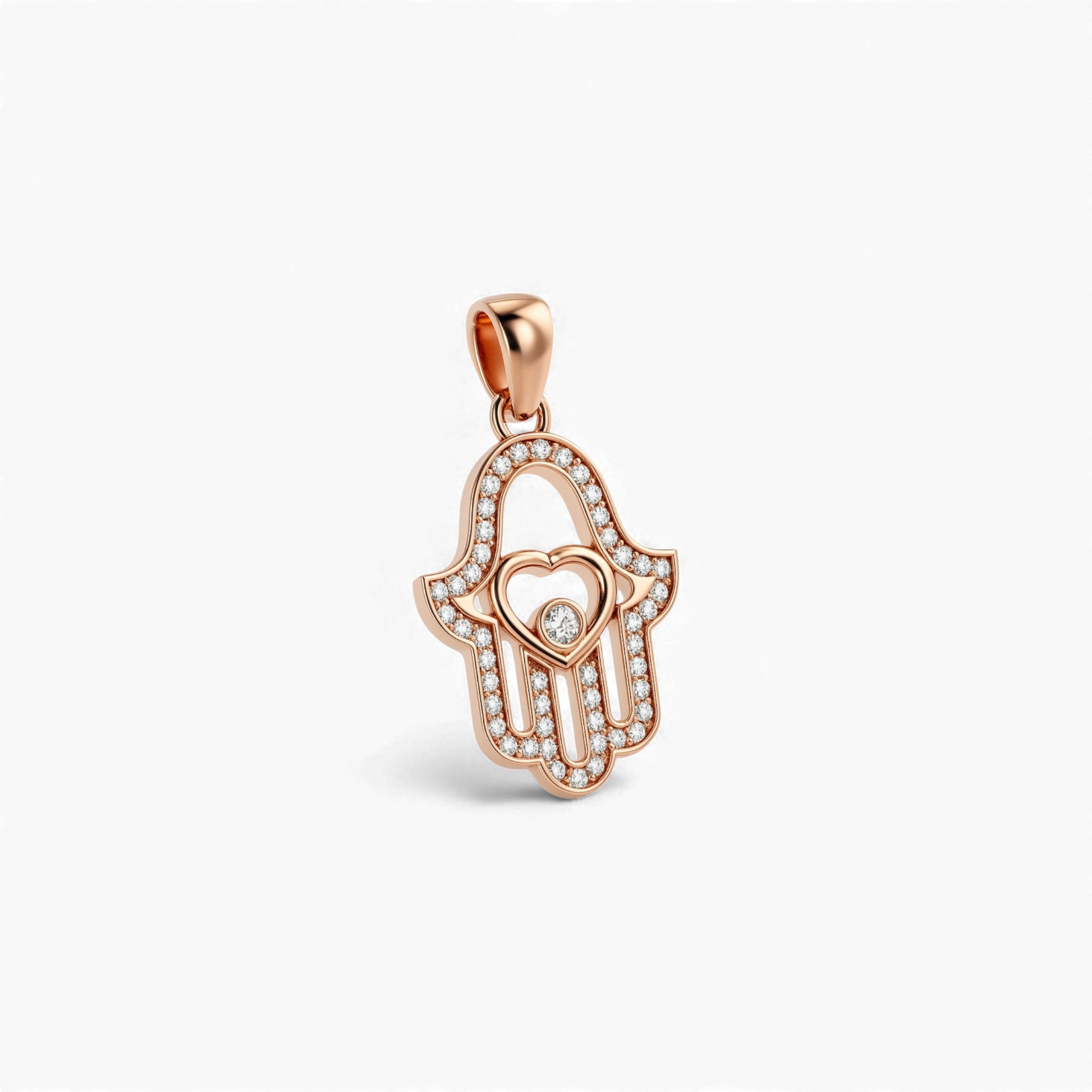Rose gold Hamsa hand pendant with a heart design on a white background