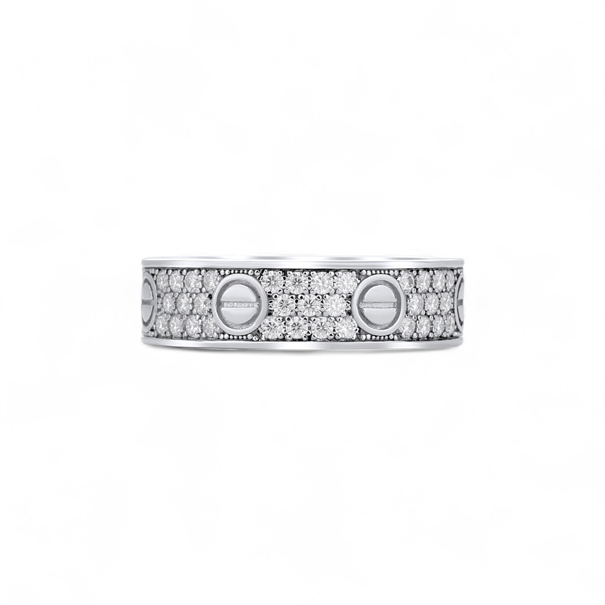 Silver ring with embedded diamonds on a white background