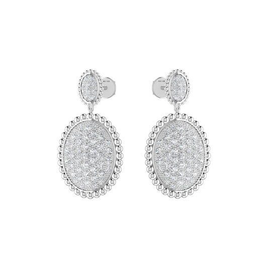 Pair of silver earrings with oval designs on a white background