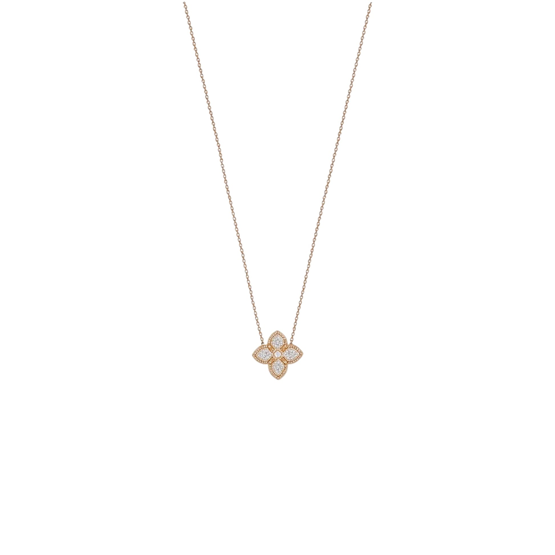 Rose gold necklace with a floral pendant on a white background