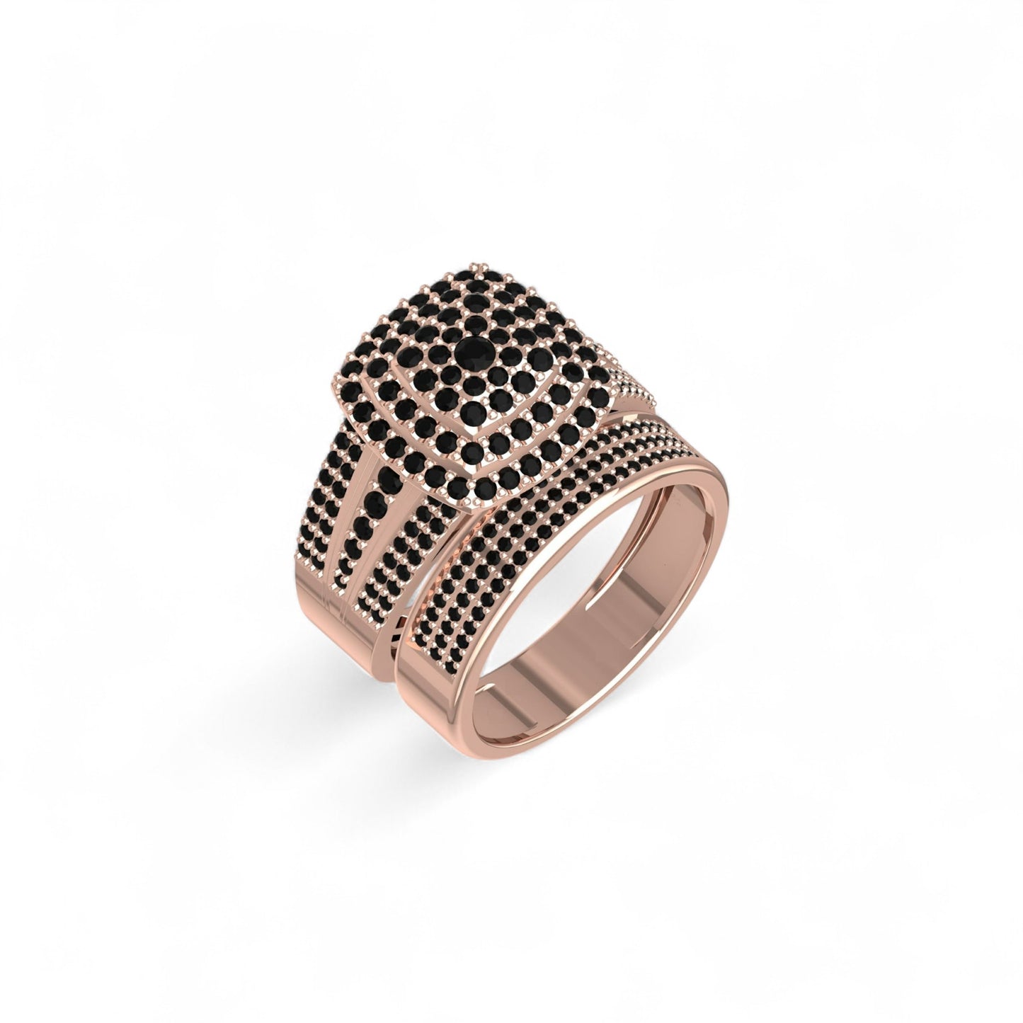 Rose gold ring with black gemstones on a white background