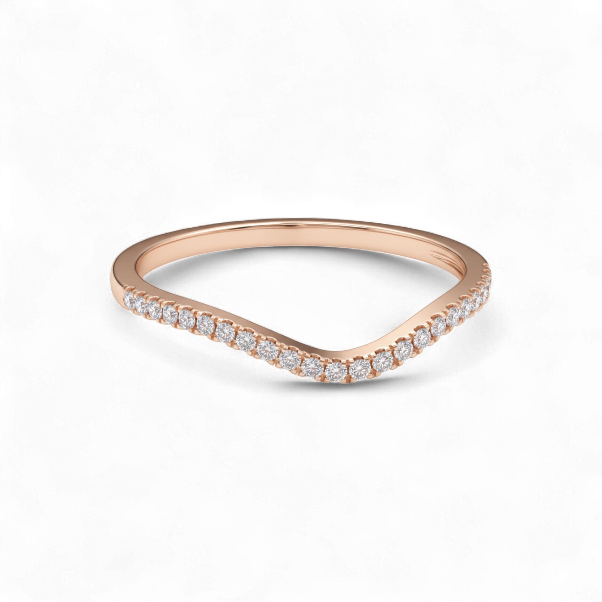 Rose gold ring with small diamonds on a white background