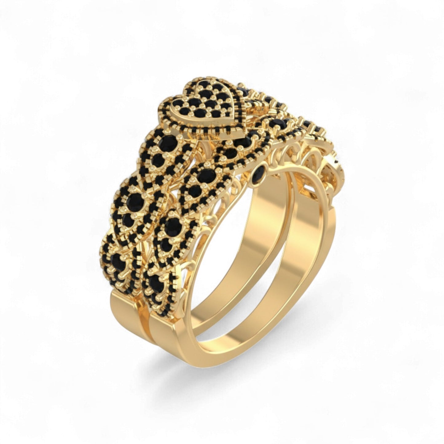 Gold ring with black gemstones on a white background