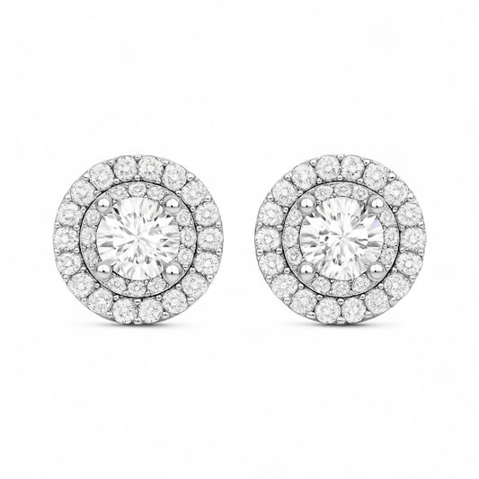 Pair of diamond earrings on a white background