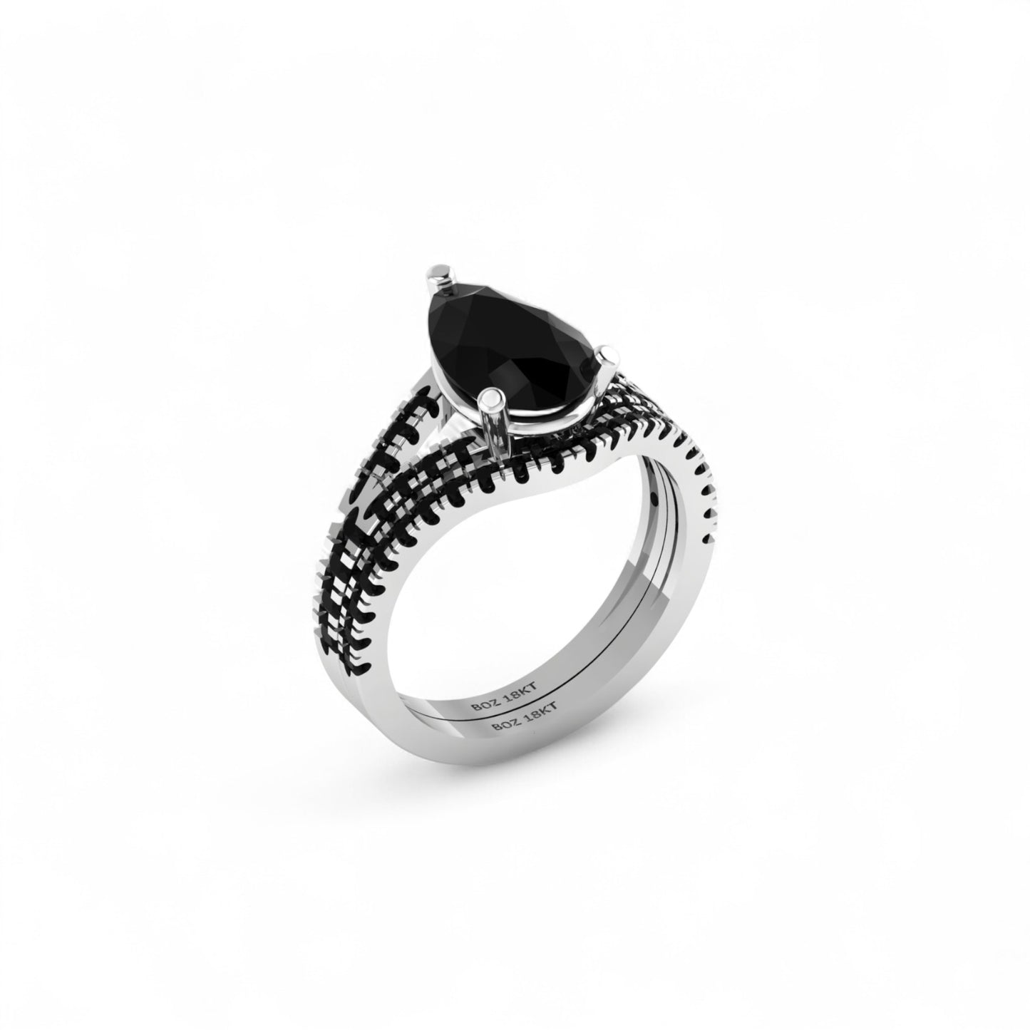 Silver ring with a black gemstone on a white background