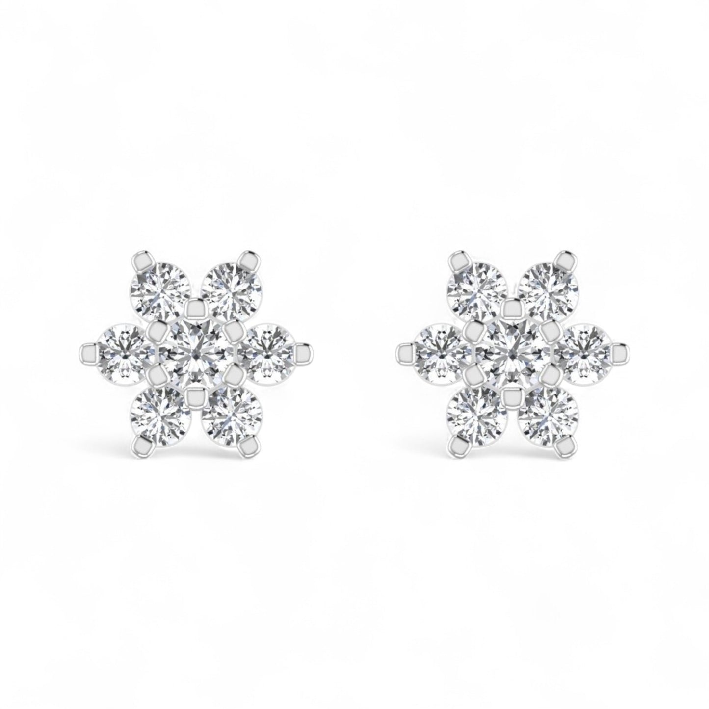Pair of diamond earrings on a white background