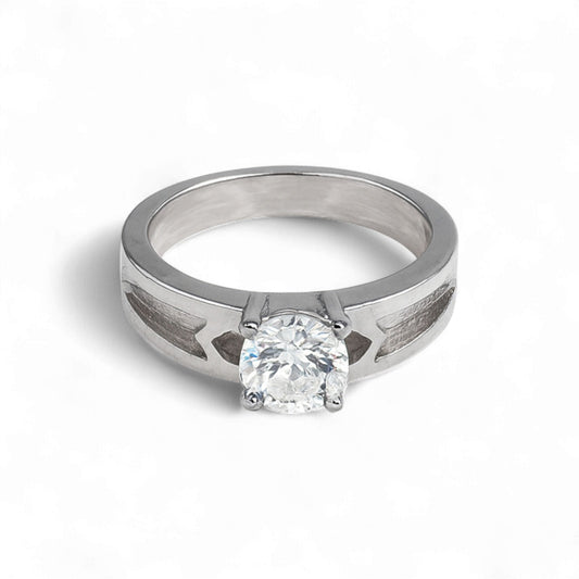 Silver ring with a diamond on a white background