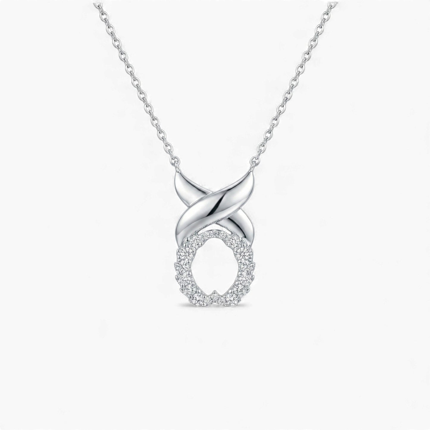 Silver necklace with an infinity pendant on a white background